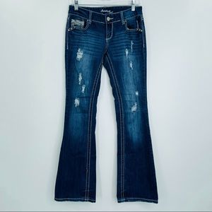 Amethyst distressed Racheal boot cut jeans